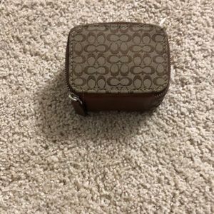 Coach travel pill case